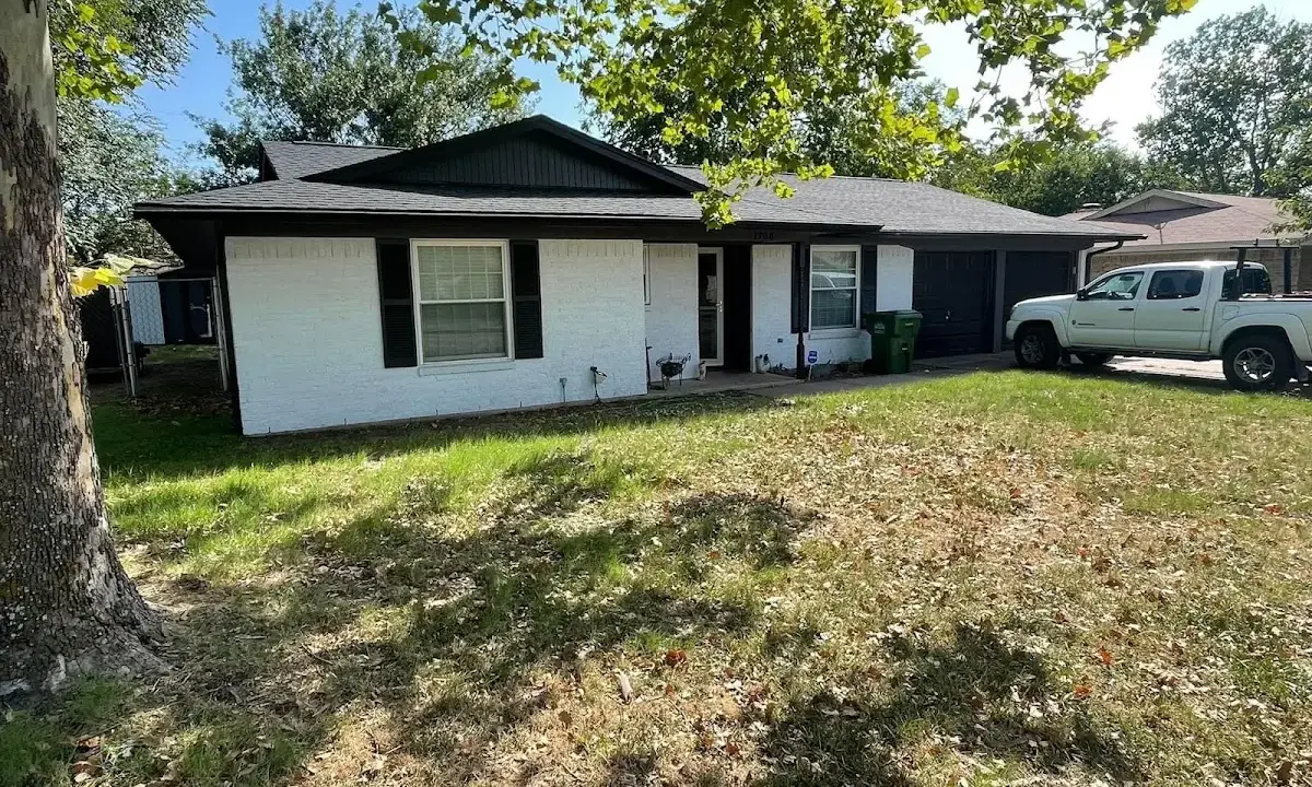 Professional roofing crew working on a residential roof in Colebrookdale